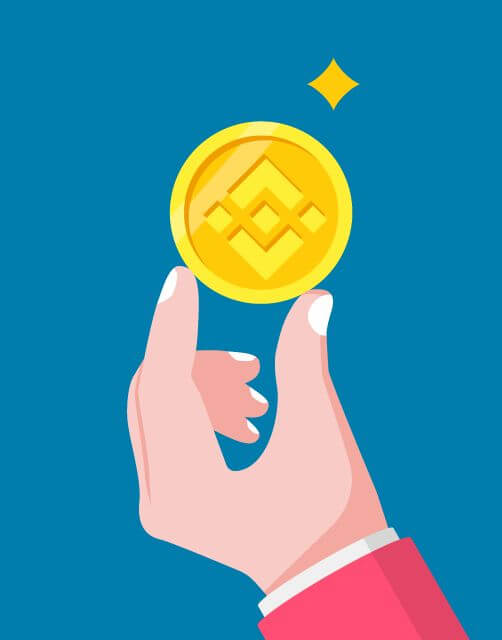 Binance Coin, BNB, being held in a hand