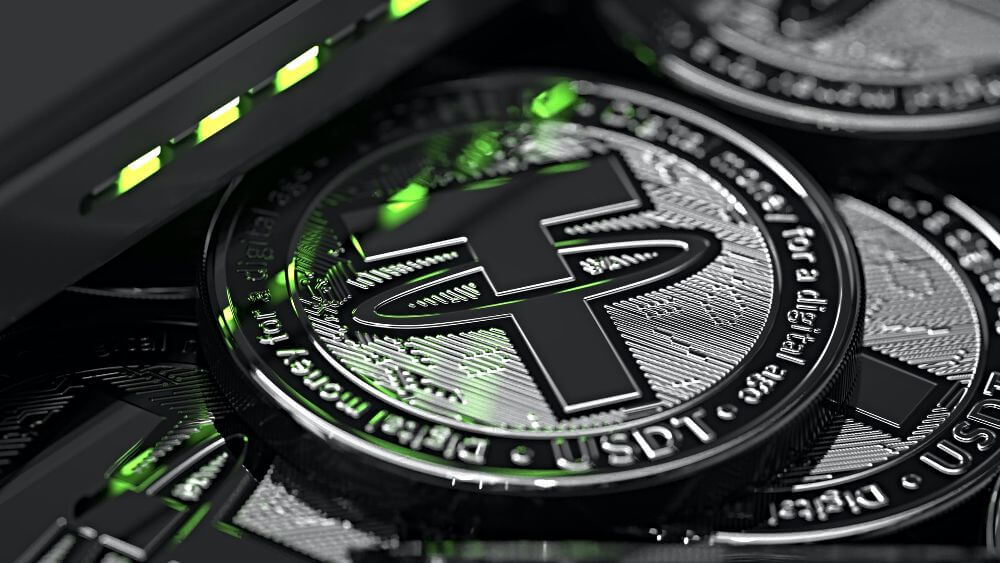 Tether (USDT) cryptocurrency, represented by a physical coin.