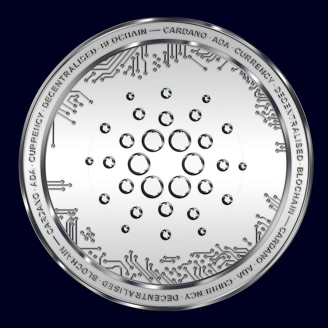 Cardano (ADA) cryptocurrency, represented by a physical silver coin. 