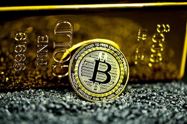 Bitcoin and a gold bar