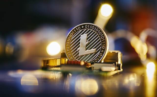 Litecoin (LTC) cryptocurrency, represented by a physical coin.